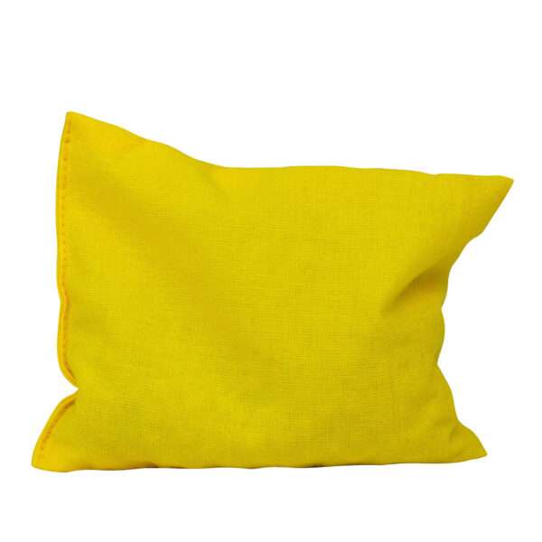 Żółty woreczek bawełniany sensoryczny z grochem w środku do nauki sensoryki dla dzieci