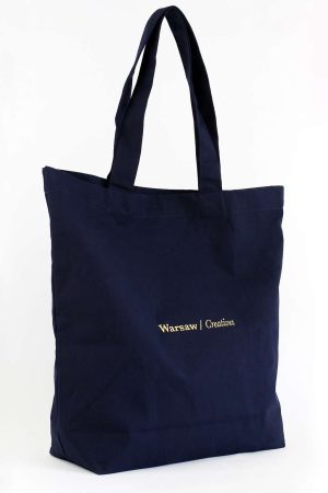 Czarna, elegancka torba bawełniana z haftowanym złotym logo Warsaw Creatives